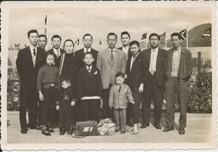 Members of the Wong Family seeing Frank off at the Hong Kong Airport. April 1958.